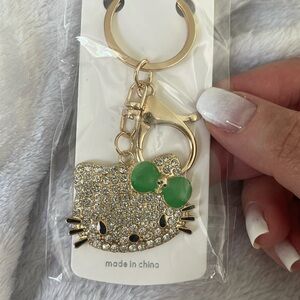 Hello Kitty Gold tone green bow Keychain purse charm w/ key ring crab claw hook